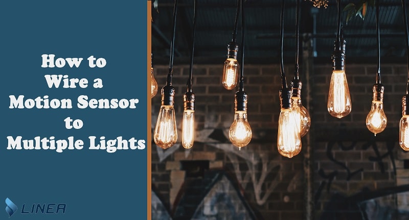 What are the benefits of wiring a motion sensor to multiple lights?